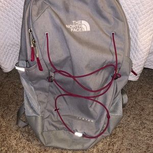 Grey and Purple North Face Back Pack